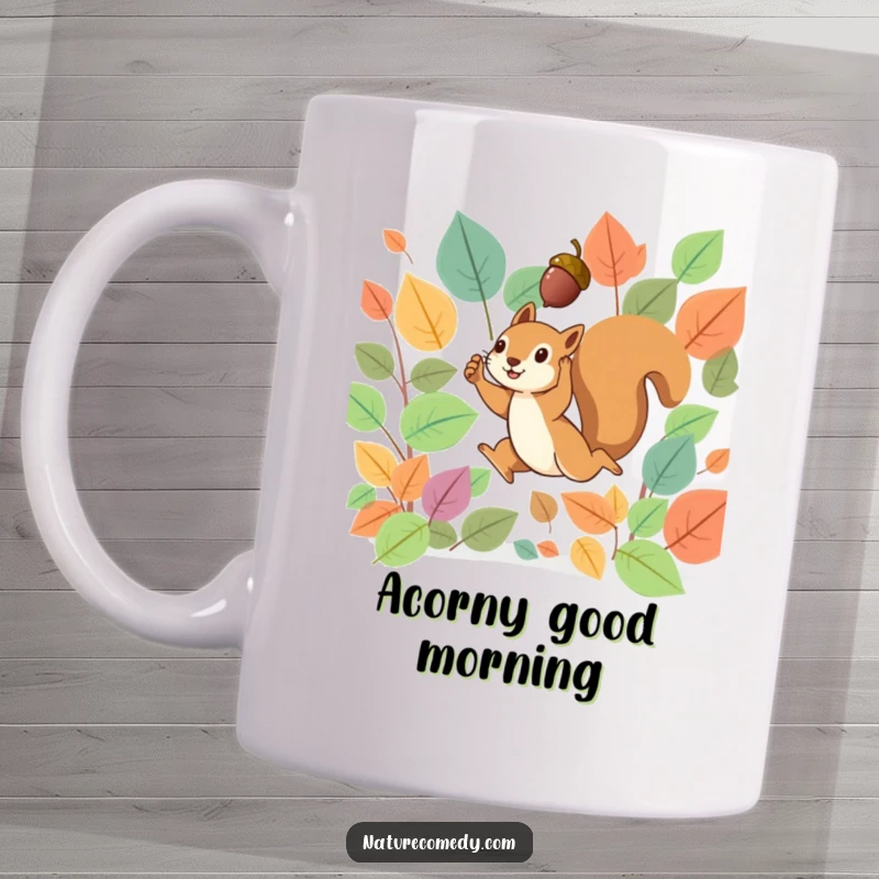 Funny squirrel mug featuring a tiny squirrel leaping energetically through vibrant autumn leaves, triumphantly holding a small acorn aloft.