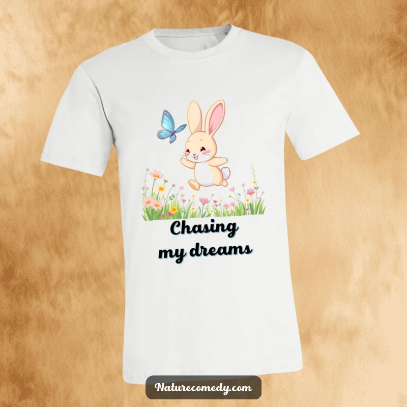 Funny bouncing bunny t-shirt, chasing a shimmering butterfly through a meadow of wildflowers, showcasing playful freedom and vibrant nature.