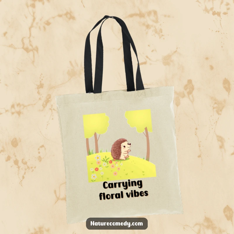 Funny hedgehog tote bag, a happy hedgehog rolling down a grassy hill, leaving a trail of flowers, great for errands.